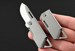 خرید چاقو آنباکسینگ تیتانیومی تاشوی قابل آویز از دسته کلید D2 steel small steel cannon mini folding knife