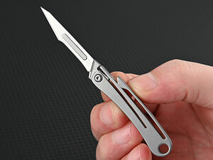 خرید چاقوی آنباکسینگ تیتانیومی تاشو دارای دو نوع تیغه قابل تعویض Replaceable Blade Unboxing Knife