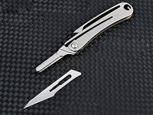 کیفیت چاقوی آنباکسینگ تیتانیومی تاشو دارای دو نوع تیغه قابل تعویض Replaceable Blade Unboxing Knife
