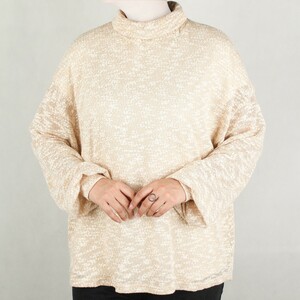 بافت زنانه یقه شل آستین مچی