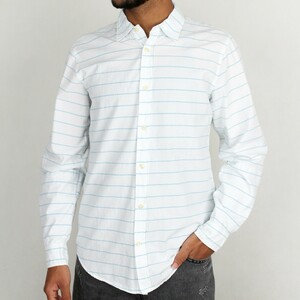 پیراهن مردانه از برند riv/sd در طرح  راه راه سفید آبی