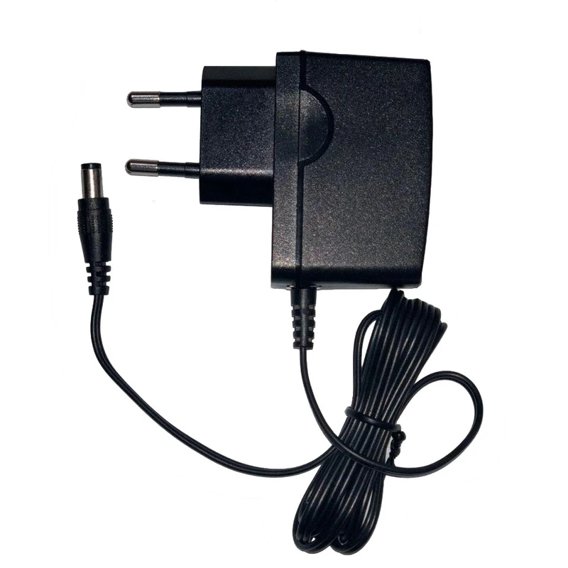 آداپتورتی‌پی‌لینک مدل T090060-2C1 با خروجی 9 ولت 0.6 آمپر ا فلاح نت