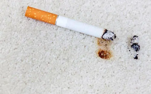 آثار سوختگی زغال و سیگار را از روی فرش پاک کنید