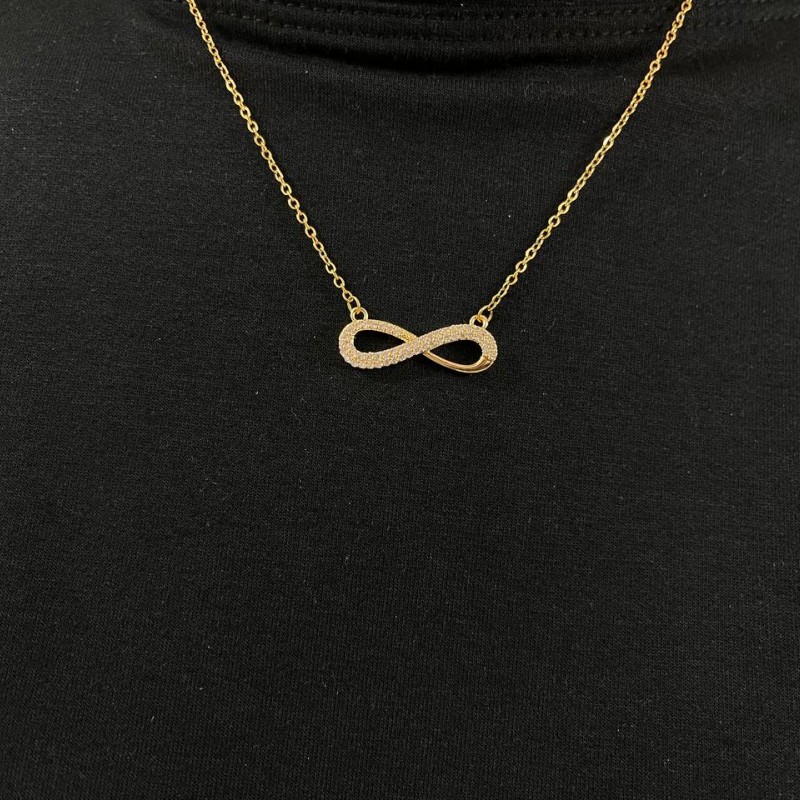 گردنبند زنانه طرح بی‌نهایت طلایی با نگین‌های درخشان