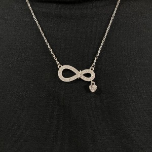 گردنبند زنانه طرح اینفینیتی با آویز قلب و نگین‌های درخشان