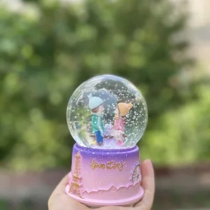 گوی موزیکال چراغ‌دار طرح دختر و پسر