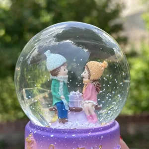 گوی موزیکال چراغ‌دار طرح دختر و پسر