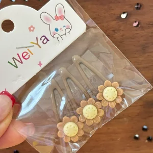 گیره مو طرح گل قهوه‌ای