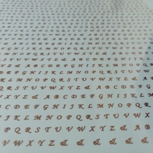 طلق رزین طرح حروف لاتین طلایی سایز کوچک