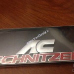 AC Schintzer Metal Badge