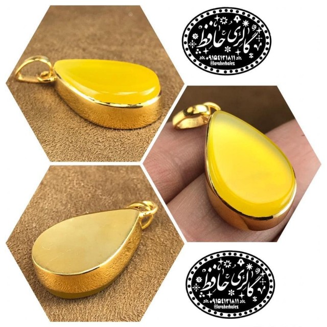 مدال عقیق زرد خراسانی قاب نقره همراه گنجینه پنج حرز شریف