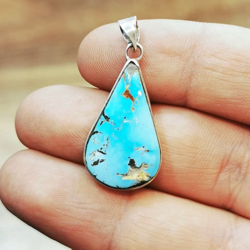 مدال فیروزه نیشابوری قاب نقره دستساز همراه گنجینه پنج حرز شریف