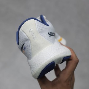 ساکنی راید 18 سفید آبی زرد Saucony Ride 18