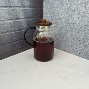 کتری  پیرکس طرح سنگی آنتی شوک درب بامبو دسته سبز اعیانی