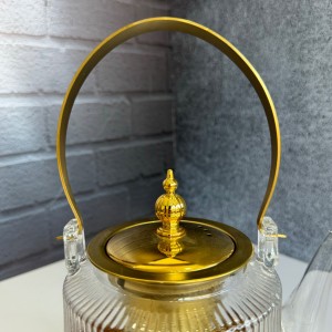 قوری پیرکس درب استیل طلایی صافی دار  دسته استیل  1100میل