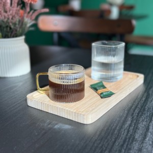 استکان پیرکس دسته طلایی شیشه‌ای مقاوم حرارت مناسب چای و دمنوش