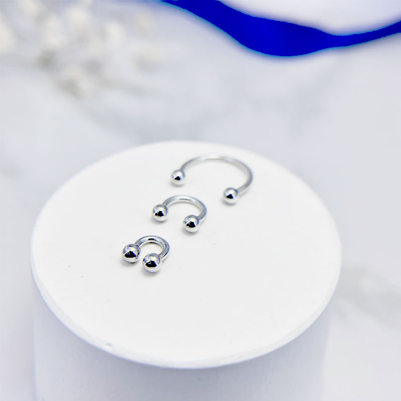 پیرسینگ نقره بینی مدل دوگوی