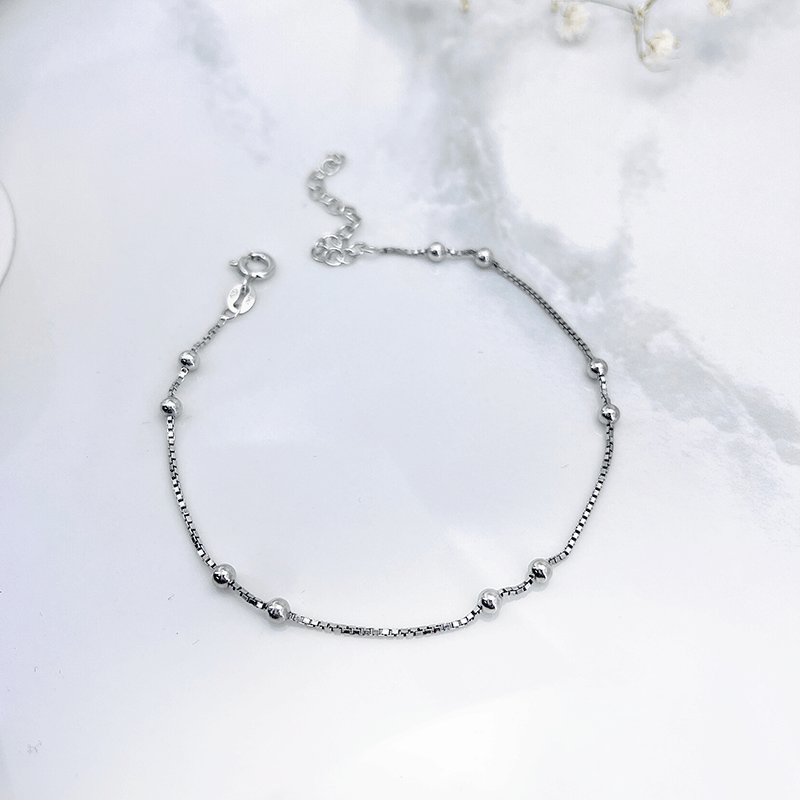 پابند نقره زنانه مدل دو گوی