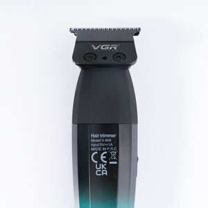 ماشین اصلاح موی سر و صورت وی جی آر مدل V-906 با تیغه سرامیکی پوشش DLC، موتور 9000 دور در دقیقه، باتری 2000 میلی‌آمپر ساعت با 240 دقیقه عمر شارژ، صفحه نمایش LED، طراحی ارگونومیک و مقاوم، قابلیت صفرزن، خط زن و حجم زن