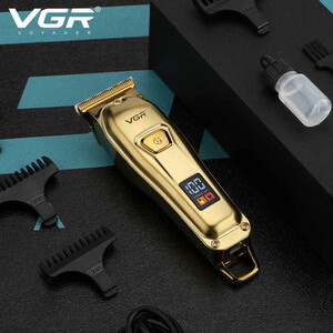 ماشین اصلاح موی سر و صورت وی جی آر مدل V-965 با تیغه استیل ضد زنگ، قابلیت اصلاح با شماره صفر، تنظیم سرعت، شانه قابل تنظیم و باتری 600 میلی‌آمپر ساعت با شارژ USB و طراحی ارگونومیک و مقاوم در برابر لغزش