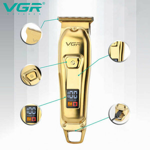 ماشین اصلاح موی سر و صورت وی جی آر مدل V-965 با تیغه استیل ضد زنگ، قابلیت اصلاح با شماره صفر، تنظیم سرعت، شانه قابل تنظیم و باتری 600 میلی‌آمپر ساعت با شارژ USB و طراحی ارگونومیک و مقاوم در برابر لغزش