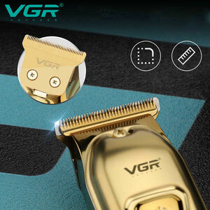 ماشین اصلاح موی سر و صورت وی جی آر مدل V-965 با تیغه استیل ضد زنگ، قابلیت اصلاح با شماره صفر، تنظیم سرعت، شانه قابل تنظیم و باتری 600 میلی‌آمپر ساعت با شارژ USB و طراحی ارگونومیک و مقاوم در برابر لغزش