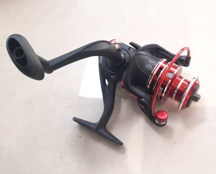 چرخ ماهیگیری fishing real dt3000