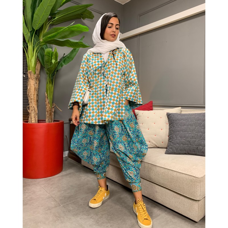 شوميز سفيد جلو باز و شلوار سنبادى فيروزه اى خٌنَك