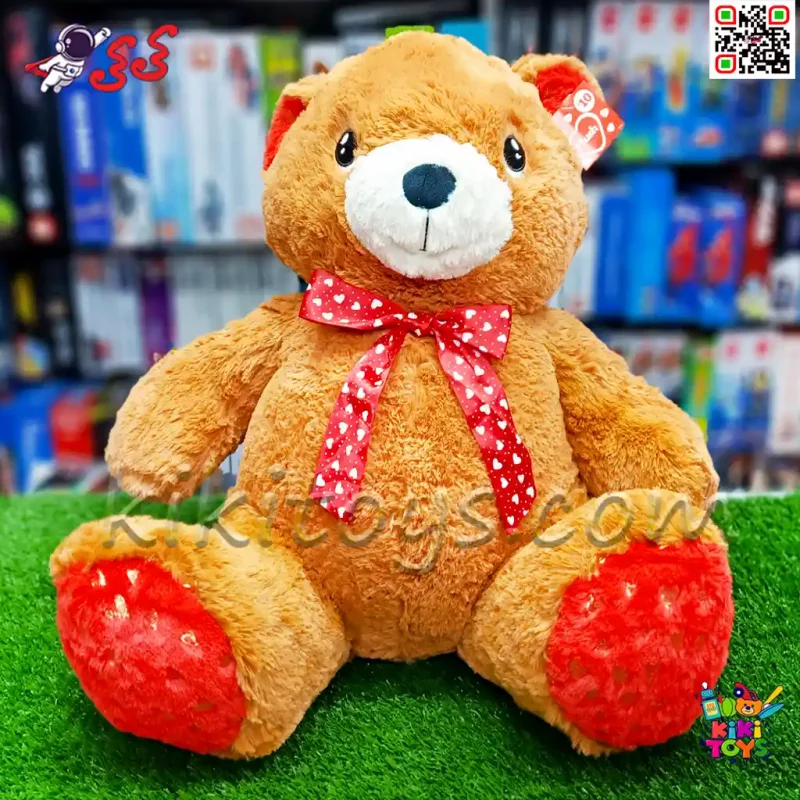 عروسک پولیشی خرس قهوه‌ای بزرگ با پاپیون قرمز قلبی – نرم، بغل‌کردنی و دوست‌داشتنی