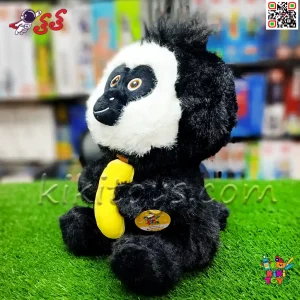 نمای نزدیک از صورت بامزه و چشم‌های درخشان میمون؛ لبخندی که دل‌نشین است