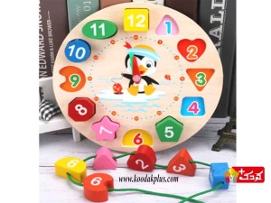 ساعت دیواری چوبی طرح پنگوئن و جایگذاری اشکال هندسی