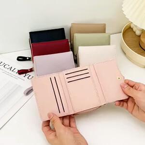 کیفیت کیف پول زنانه تاشو تائومیک‌میک