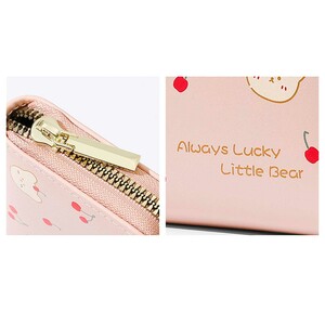 نوشته و زیپ کیف پول تائومیک‌میک