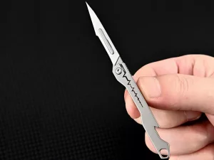 چاقو آنباکسینگ تیتانیومی تاشوی قابل آویز از دسته کلید Titanium alloy mini folding knife