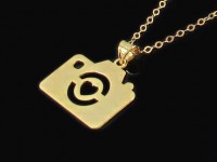 پلاک طلای دوربین