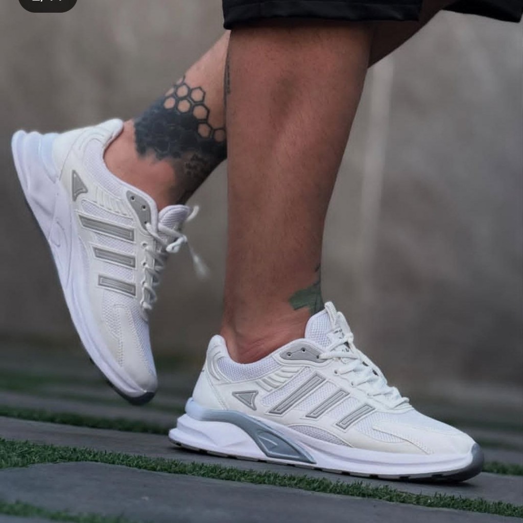 فروش واقعی کفش اسپرت مردانه مدل جدید آدیداس با کیفیتی عالی رنگ سفید طوسی با ارسال رایگان