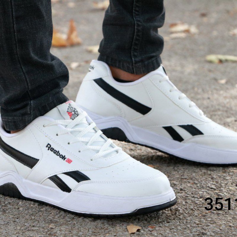 فروش ویژه کفش اسپرت مردانه مدل ریبوک رویه چرم  جذاب و شیک پسندسفید خط مشکی کد 3511