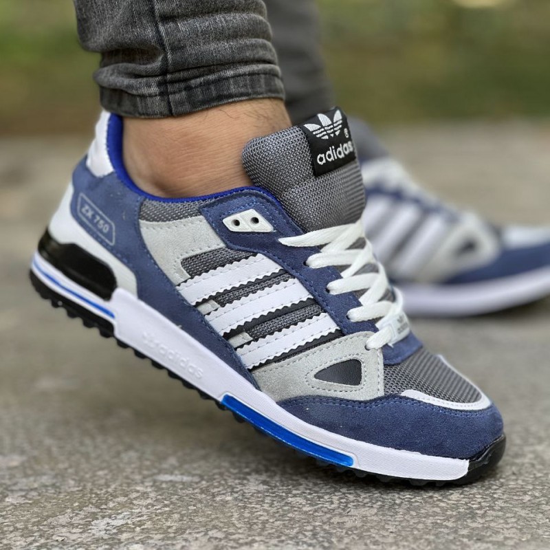 حراج ویژه کفش اسپرت مردانه پسرانه مدل ادیداس  زد ایکس نرم و راحت  رنگ ابی سفید