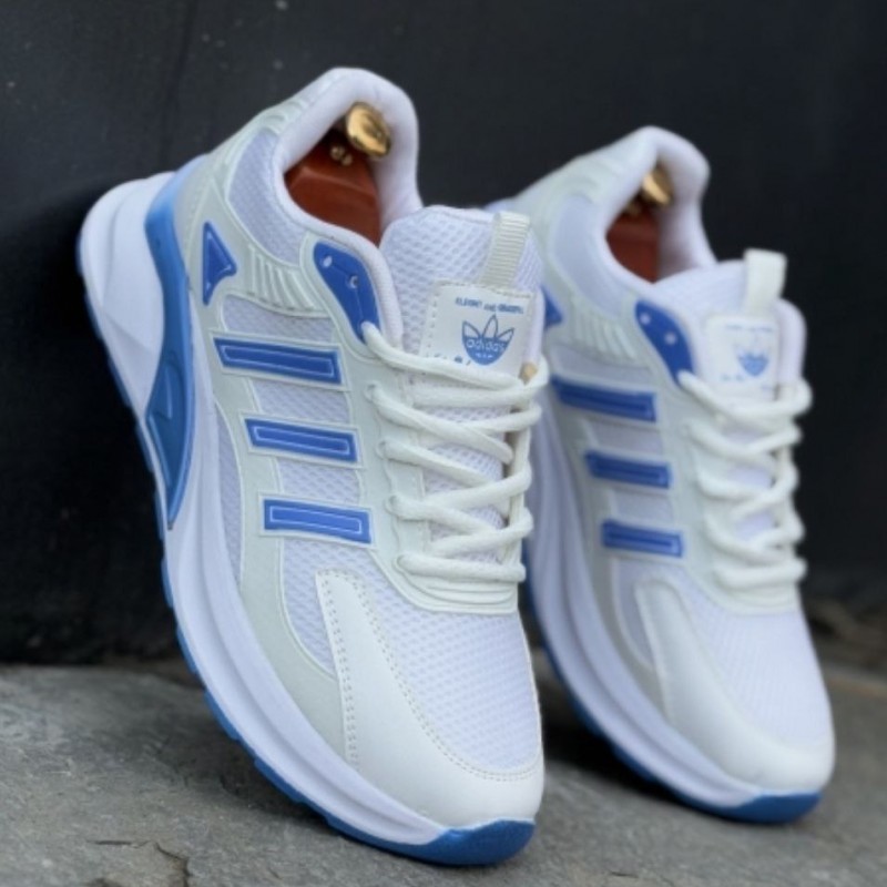 حراج ارزان کفش اسپرت مردانه مدل جدید آدیداس مقاوم و جذاب رنگ سفید آبی  با ارسال رایگان