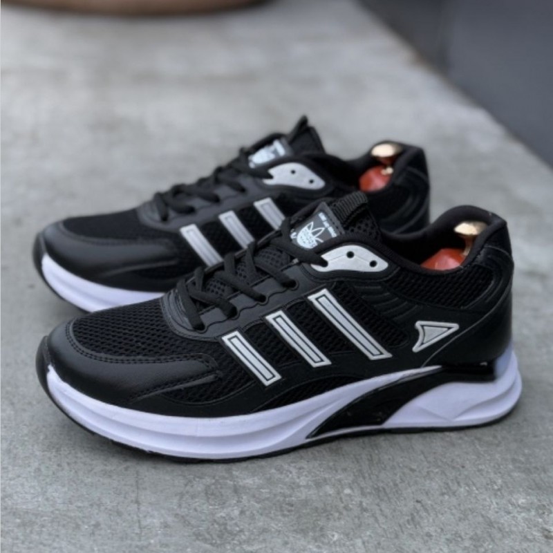 فروش شگفت انگیز  کفش اسپرت مردانه مدل جدید آدیداس بادوام و به روز رنگ مشکی سفید   با ارسال رایگان