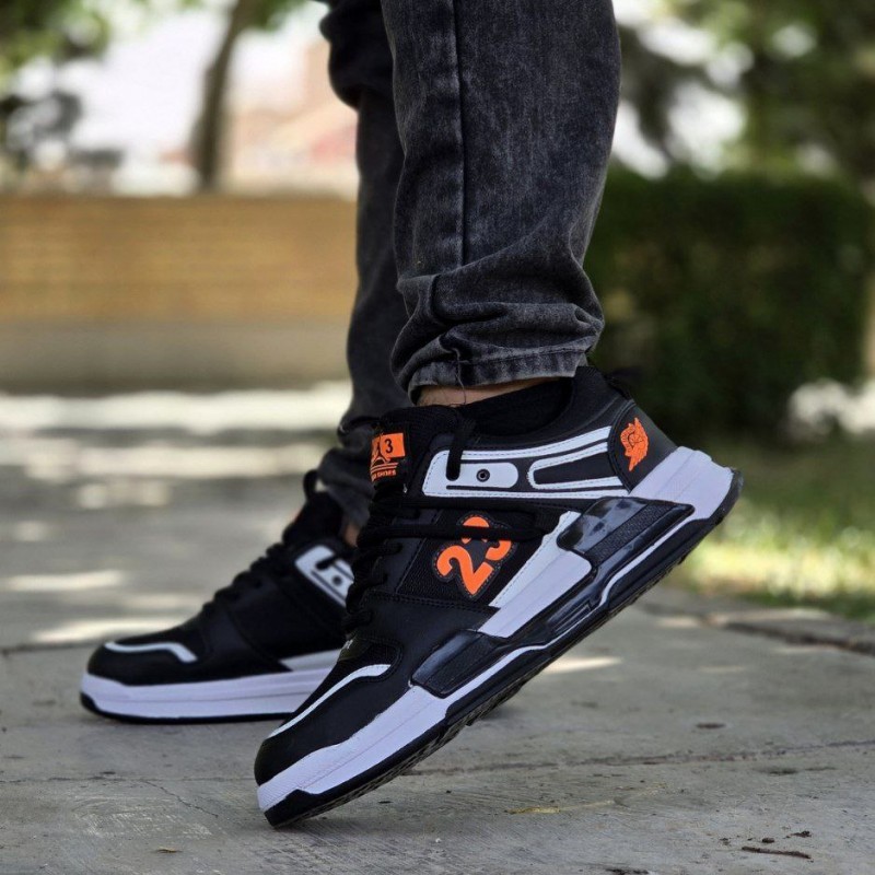 حراج فوق العاده کفش اسپرت مردانه پسرانه مدل جردن 23 رنگ مشکی نارنجی   زیره سفید  پرفروش  با ارسال رایگان