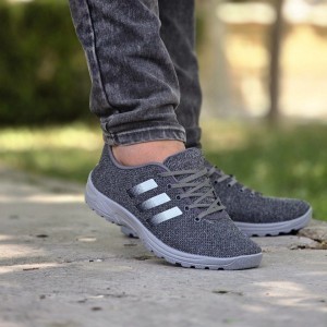 حرااااج  کفش اسپرت مردانه مدل آدیداس پرفروش و خاص رنگ مشکی سفید باارسال رایگان