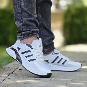 حراج شگفت انگیز کفش اسپرت مردانه پسرانه مدل ادیداس شیک و پرفروش   رنگ مشکی سفید ارسال رایگان