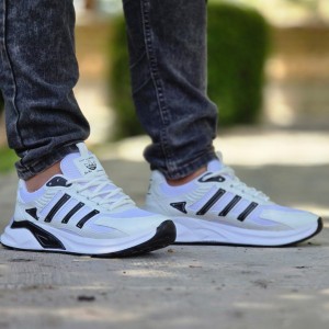 حراج شگفت انگیز کفش اسپرت مردانه پسرانه مدل ادیداس شیک و پرفروش   رنگ مشکی سفید ارسال رایگان