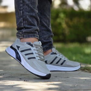 حراج فوق العاده   کفش اسپرت مردانه پسرانه مدل ادیداس پرفروش و زیبارنگ طوسی مشکی ارسال رایگان