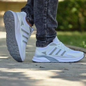 فروش بی نظیر  کفش اسپرت مردانه پسرانه مدل ادیداس راحت و مقاوم  رنگ سفید مشکی ارسال رایگان