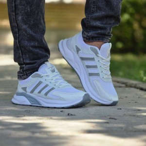 فروش بی نظیر  کفش اسپرت مردانه پسرانه مدل ادیداس راحت و مقاوم  رنگ سفید مشکی ارسال رایگان