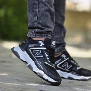 حراج شگفت انگیز  کفش اسپرت مردانه پسرانه مدل نیوبالانس شیک و جذاب رنگ مشکی سفید  ارسال رایگان