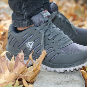 فروش باورنکردنی  کفش اسپرت  مردانه و پسرانه  مدل ریبوک زیبا و جدید رنگ سورمه ای  با ارسال رایگان