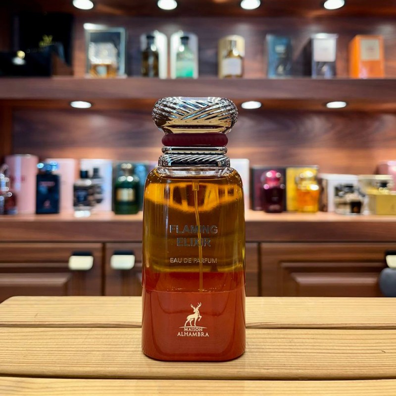 ادکلن الحمبرا مدل فلامینگ الکسیر80میل  رایحه تام فورد چری اسموکalhambra flaming elixir